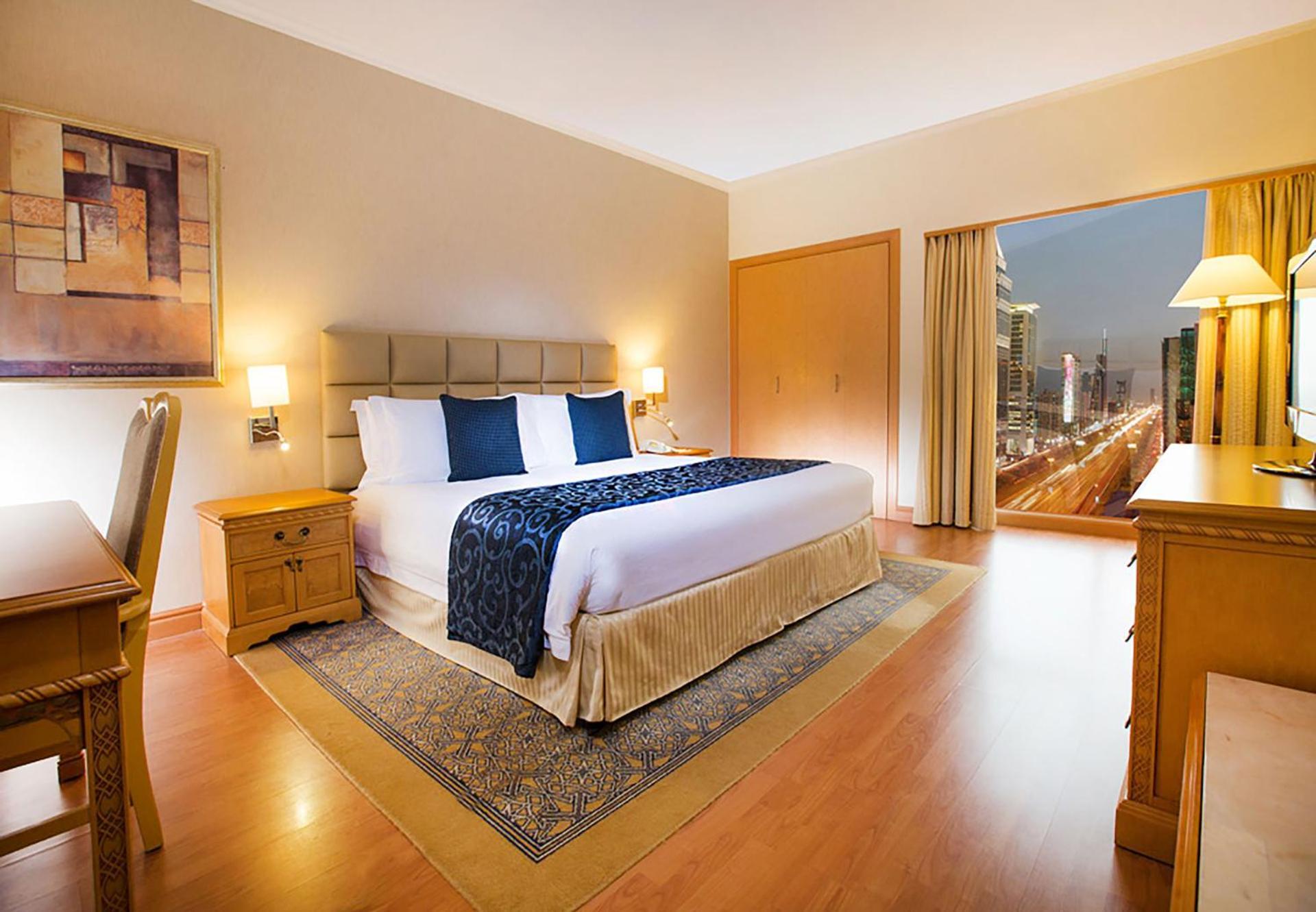 فندق كراون بلازا دبي المظهر الخارجي الصورة A bedroom at the hotel